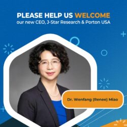 A woman in a business suit with the words porton please help welcome us.